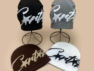 Knit beanies with star patterns in black and gray
