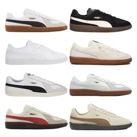 Eight low suede trainers in white, cream, black and red on gum soles