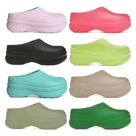 Eight platform clogs in pink, coral, black, lime, turquoise, taupe, sage and green
