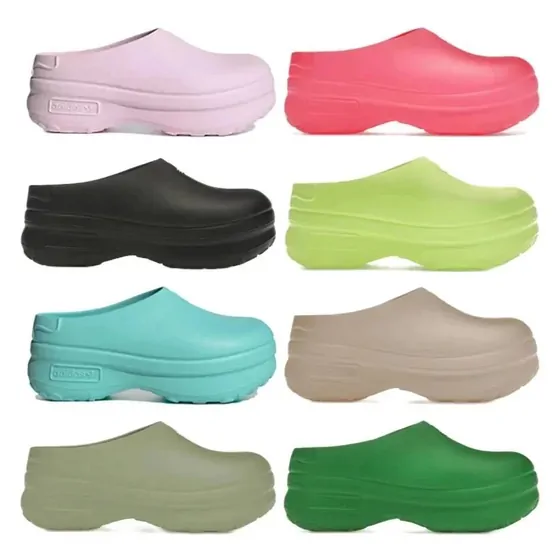Eight platform clogs in pink, coral, black, lime, turquoise, taupe, sage and green