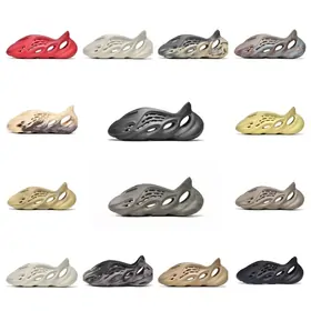 Grid of cut-out foam clogs in sand, grey, ochre, black and red