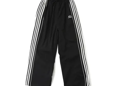 Black wide-leg track trousers with white side stripes